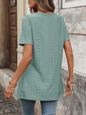 Sky blue eyelet puff sleeve top with square neckline and short sleeves.