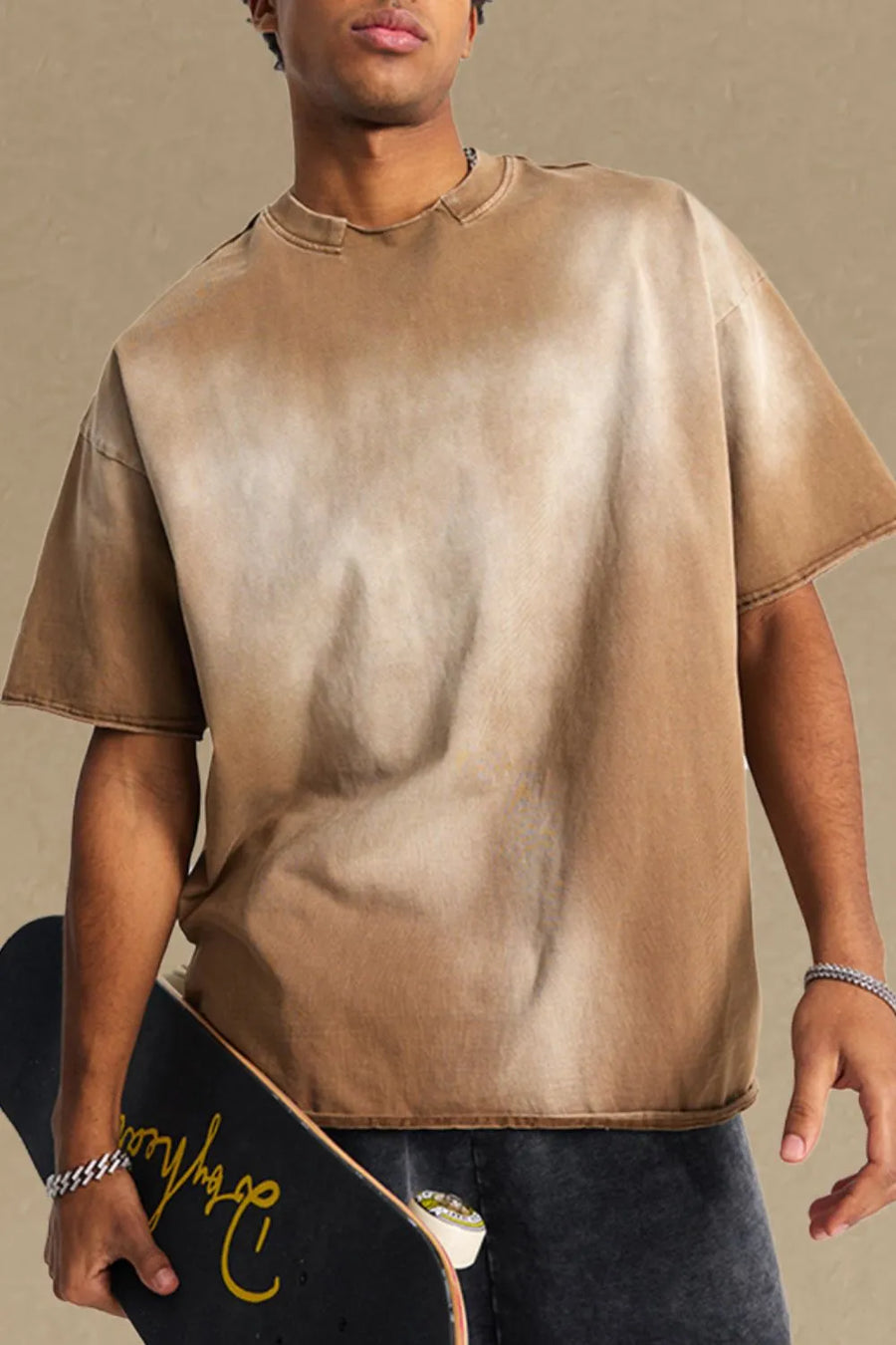 Camel acid wash boxy tee with raw seam neckline and hem.