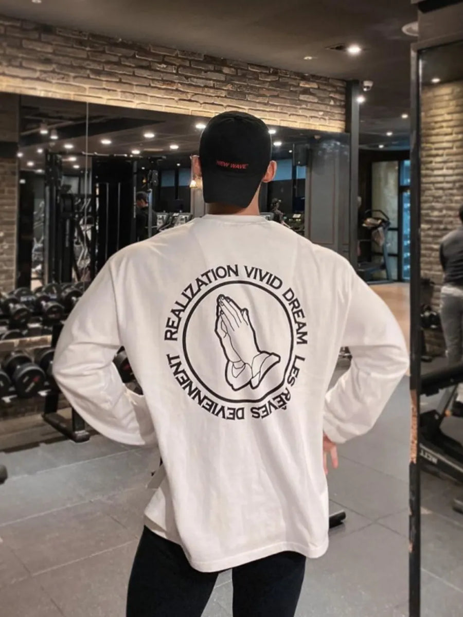 White long sleeve tee with praying hands graphic and text on back