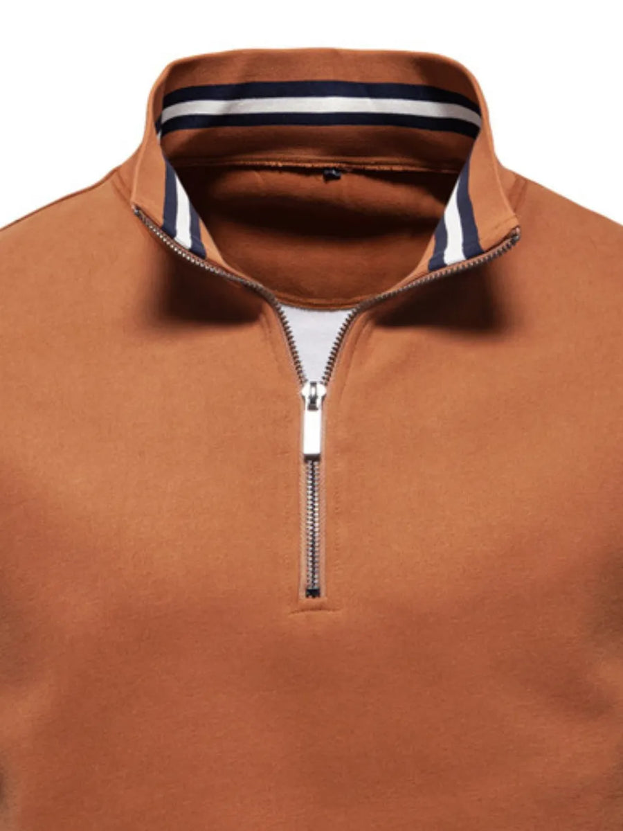 Caramel colorblock zip-neck sweatshirt with striped collar detail.