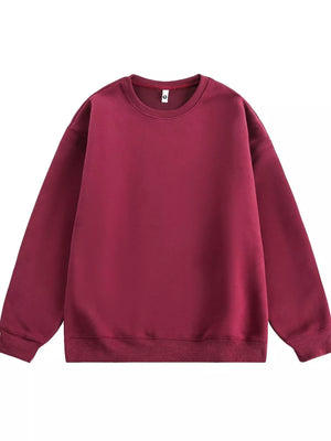 Oversized crew-neck sweatshirt in wine red with ribbed cuffs and hem.