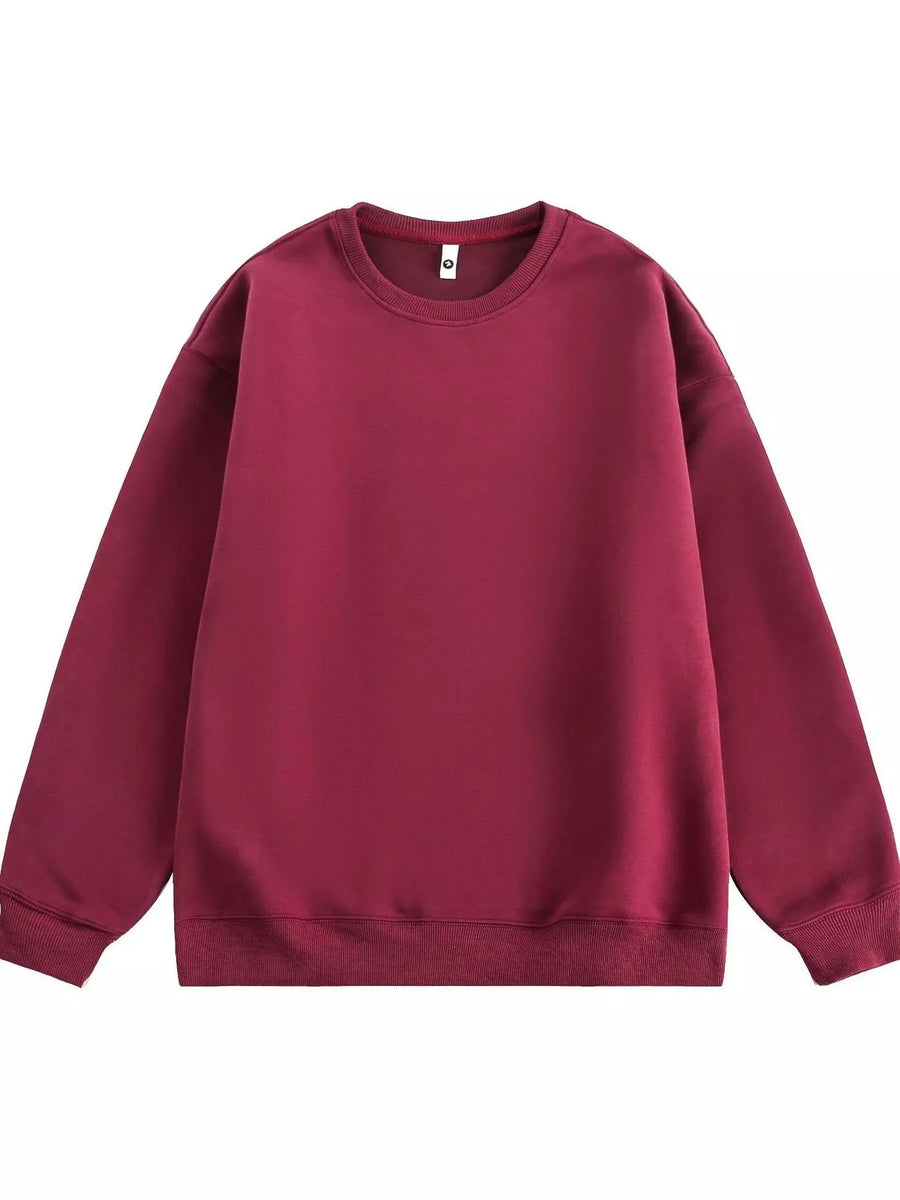 Oversized crew-neck sweatshirt in wine red with ribbed cuffs and hem.