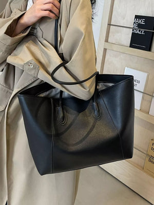 Chic structured black pu leather tote bag with clean silhouette and dual handles.
