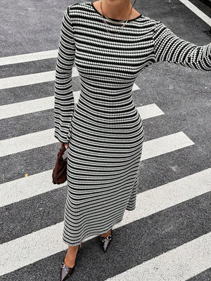 100% polyester Care instructions: Machine wash cold maxi dress in Black with fitted silhouette