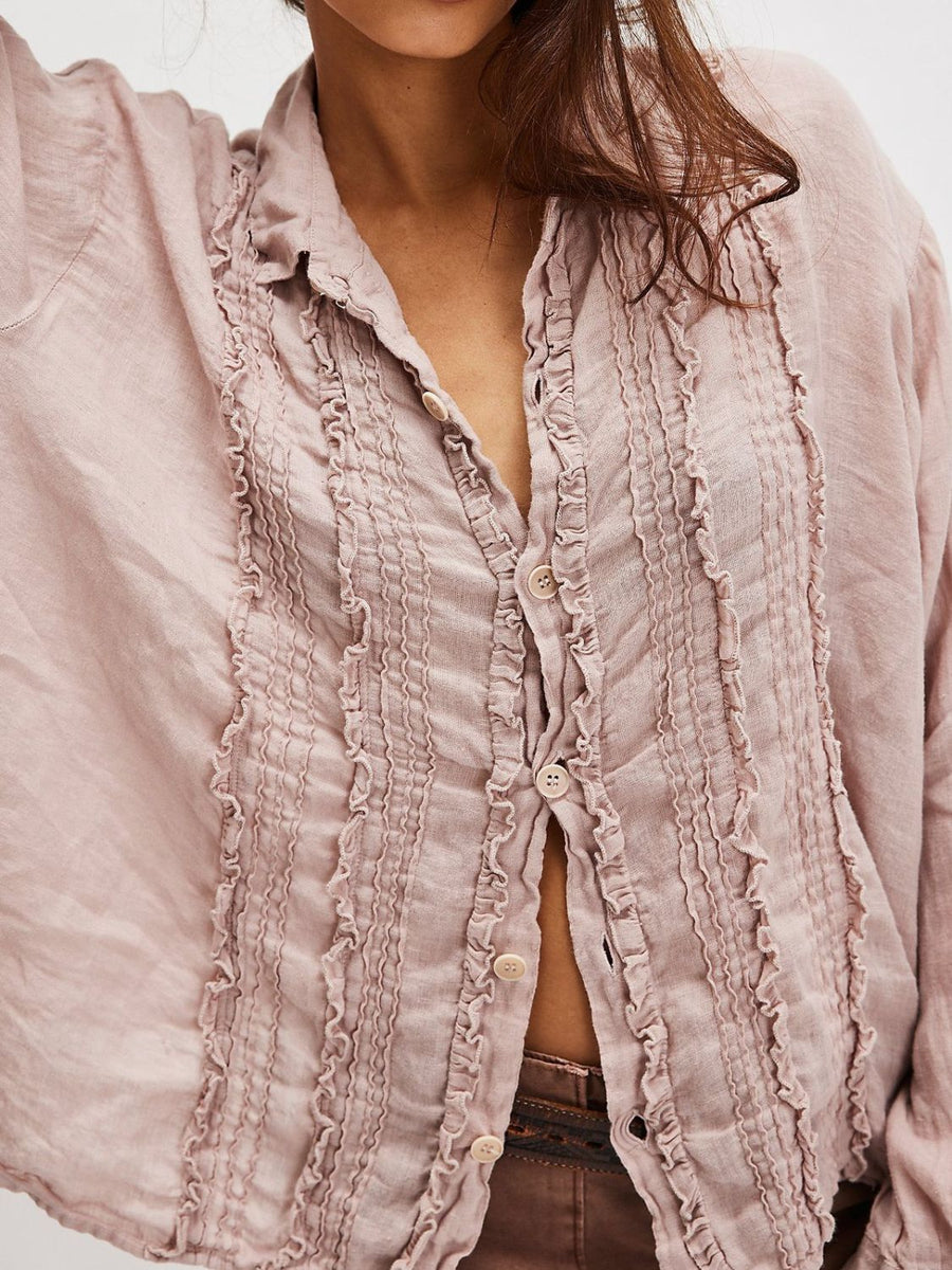 Dusty Pink linen button-down blouse with vertical ruffles and button front.