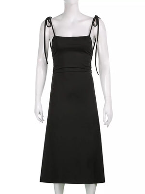 Black ruched midi dress with square neckline and tie straps