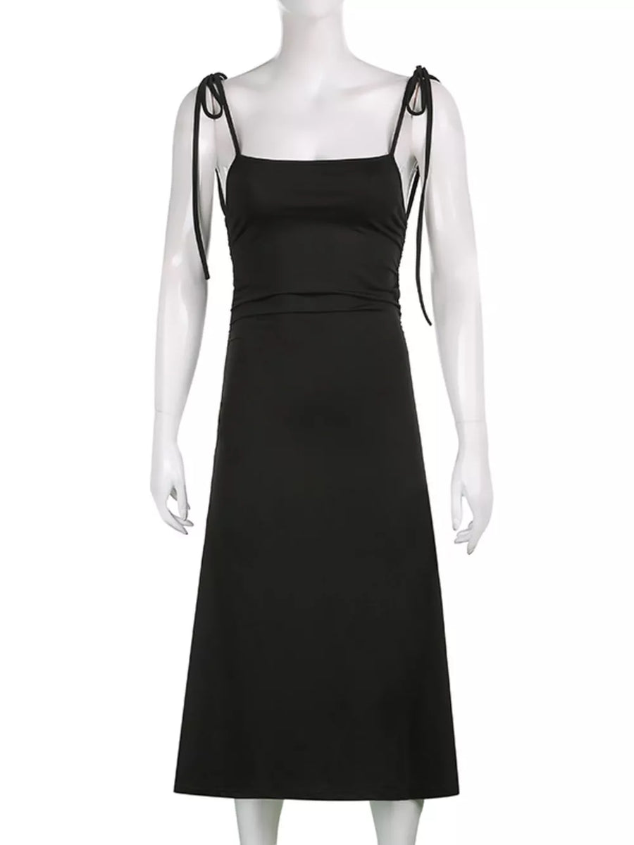 Black ruched midi dress with square neckline and tie straps