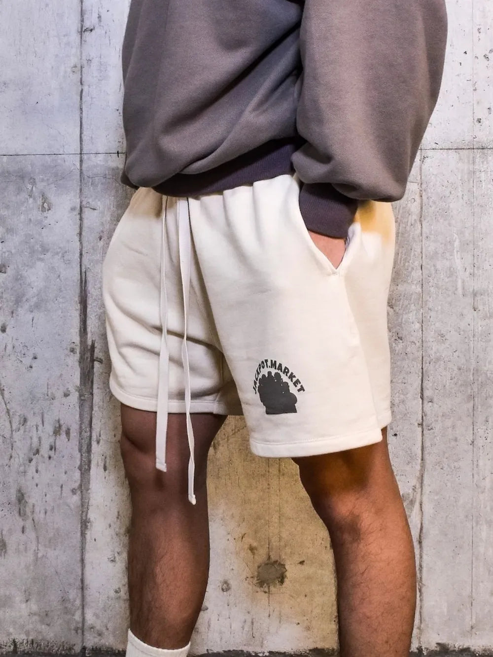 Ivory fleece drawstring shorts with black market logo detail