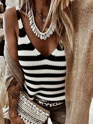 Relaxed black and white striped V-neck knit tank top with a shell necklace.