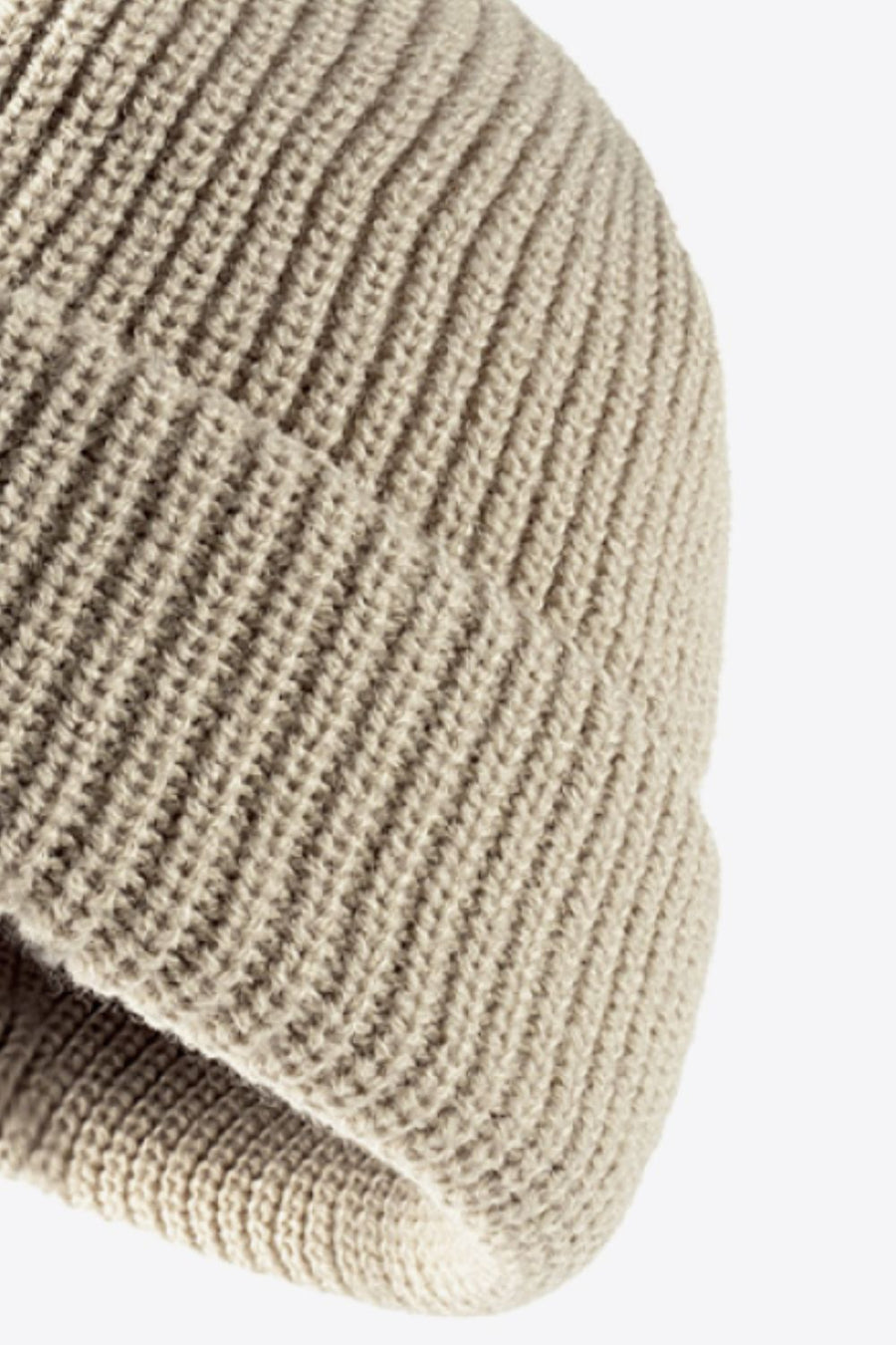 Beige ribbed knit beanie with folded edge detail