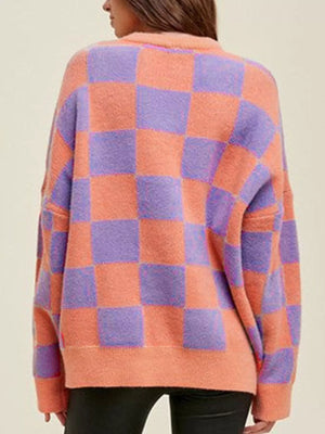Chic checkerboard knit sweater in multicolor with a cozy, relaxed fit.