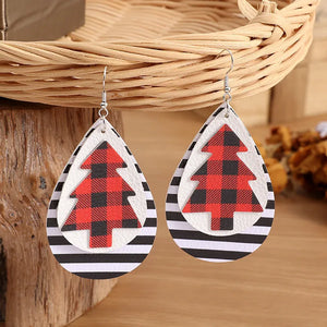 Plaid tree teardrop earrings with black and white stripes.