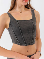 Denim corset crop top in dark gray with square neckline and seam details.