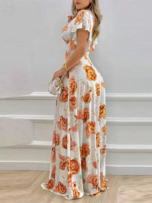 Maxi dress with floral print, V-neck, and ruffle sleeves in pumpkin.