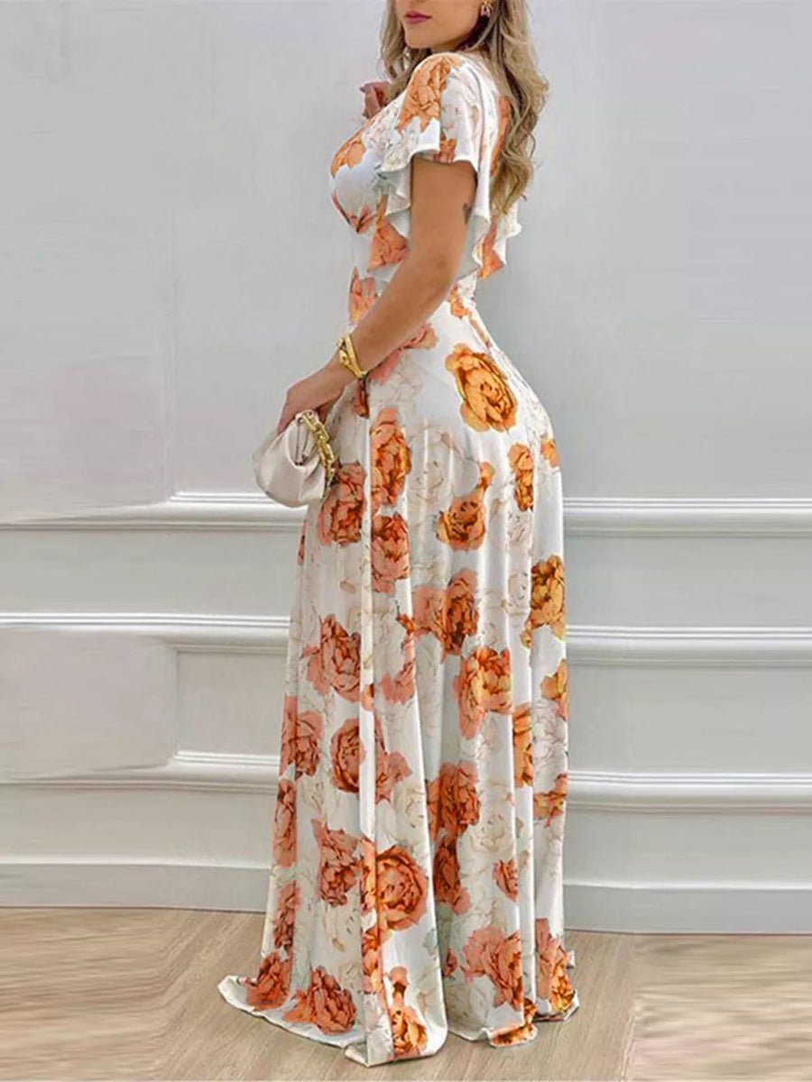 Maxi dress with floral print, V-neck, and ruffle sleeves in pumpkin.