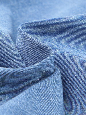 Cropped jeans in blue denim with whiskered wash detail