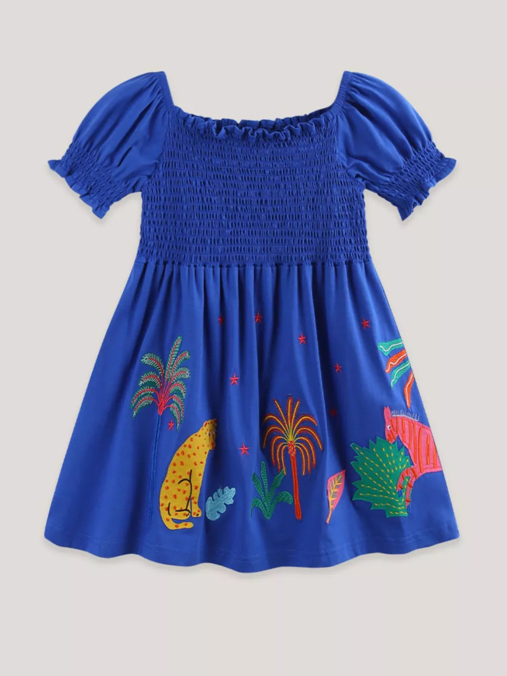 Blue cotton dress with smocked bodice, puff sleeves, and jungle animal embroidery.
