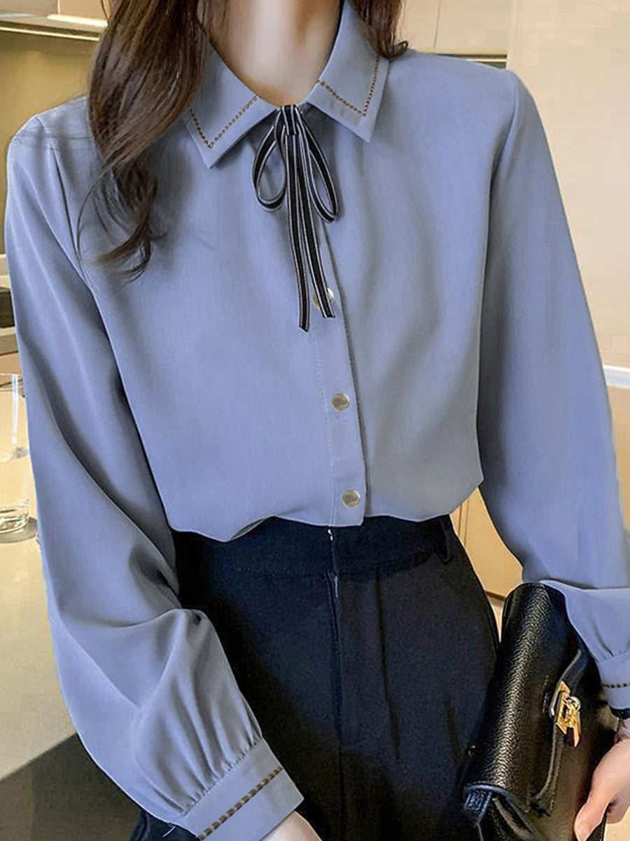100% polyester Care instructions: Machine wash cold blouse in Blue with regular silhouette