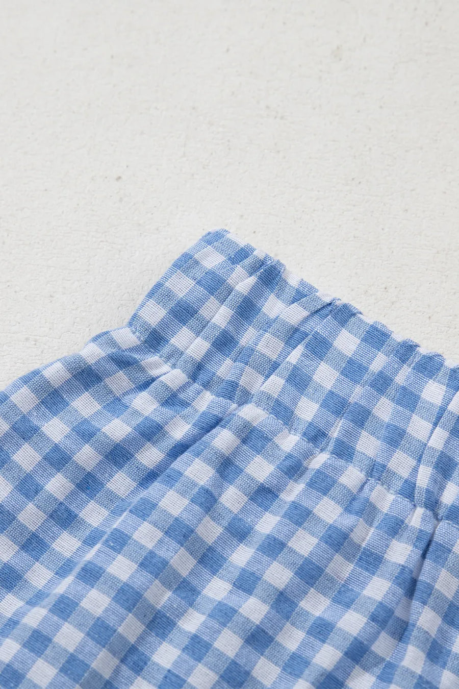 Light blue gingham boxer shorts with elastic waistband detail