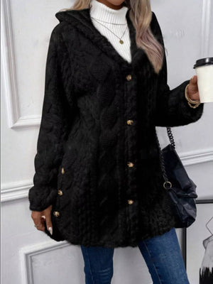 Black hooded fleece trench coat with cable knit texture and gold buttons.