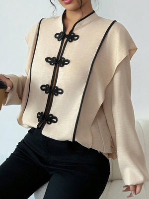 vintage-inspired blouse in light beige with mandarin collar