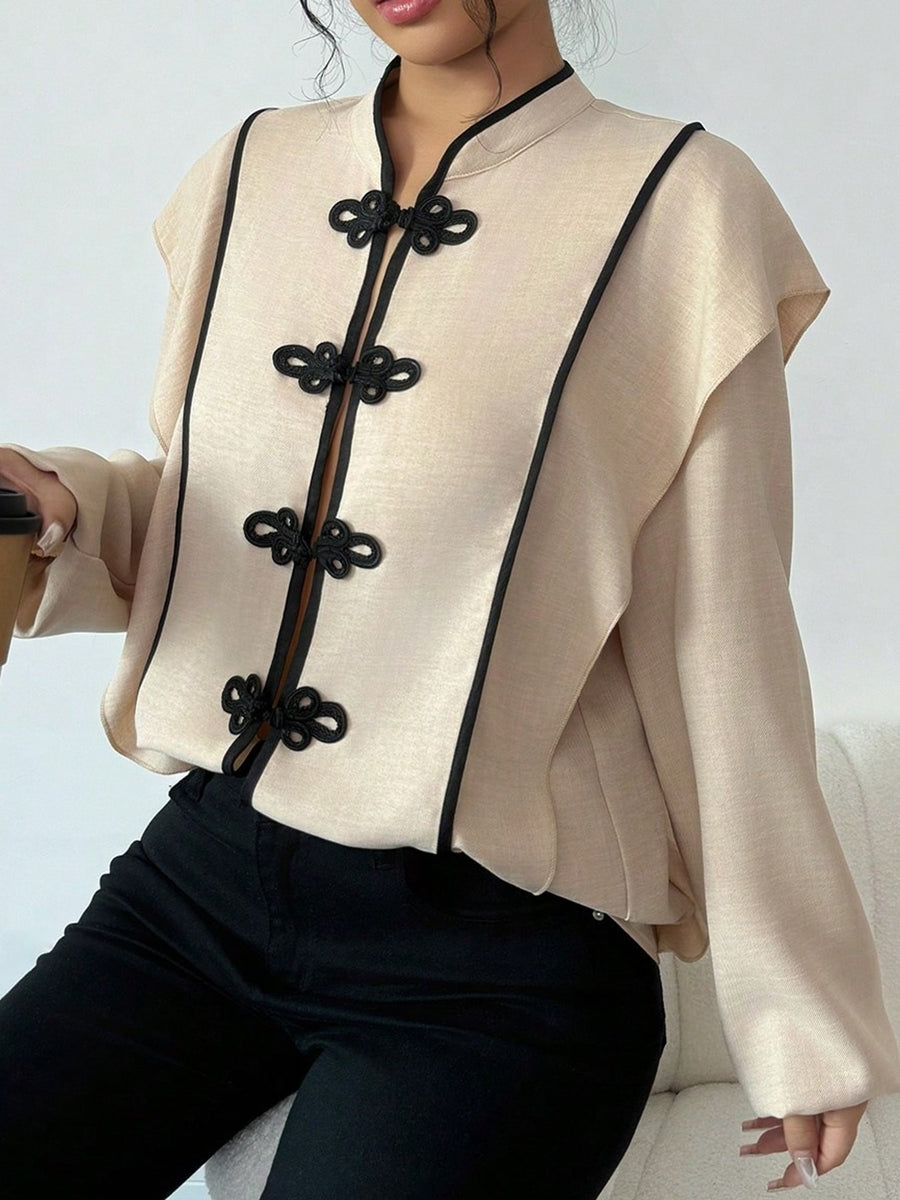 vintage-inspired blouse in light beige with mandarin collar