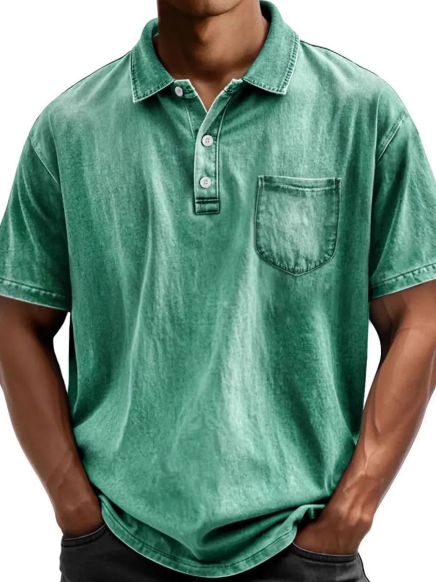 Green acid wash relaxed fit polo shirt with chest pocket and button placket.