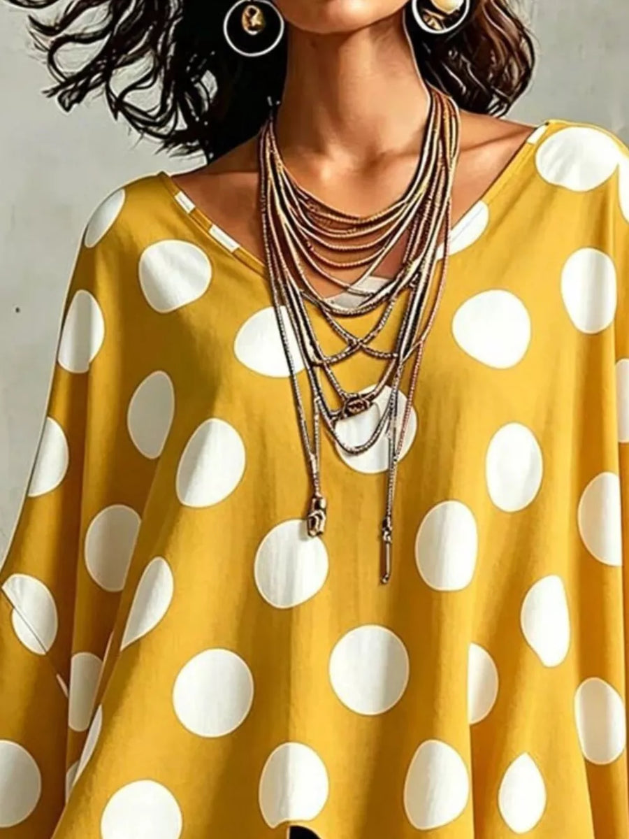 Polka Dot Asymmetrical Hem Blouse in Black