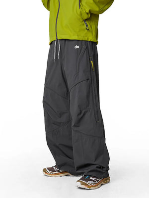 Relaxed graphite gray cargo active pants with drawstring and zip pockets.