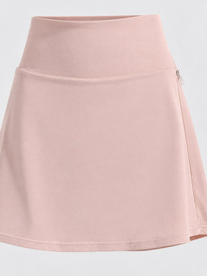 88% nylon, 12% spandex pleated skirt in Khaki with flared silhouette
