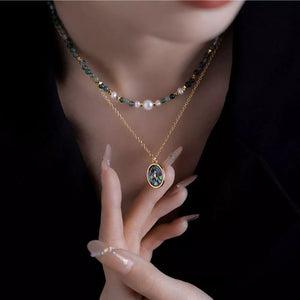 white necklace featuring layered design and organic