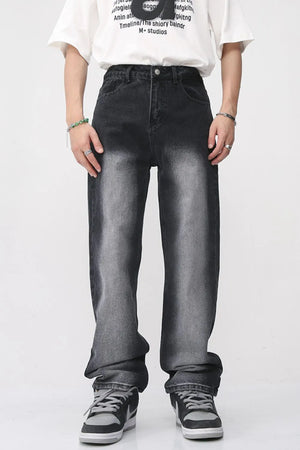 Faded wash baggy jeans in dark with a relaxed fit and gradient effect.