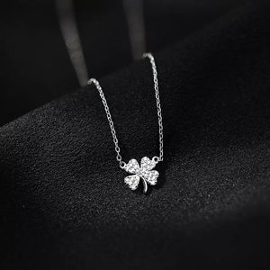 clear necklace featuring zircon embellishment and four-leaf clover motif
