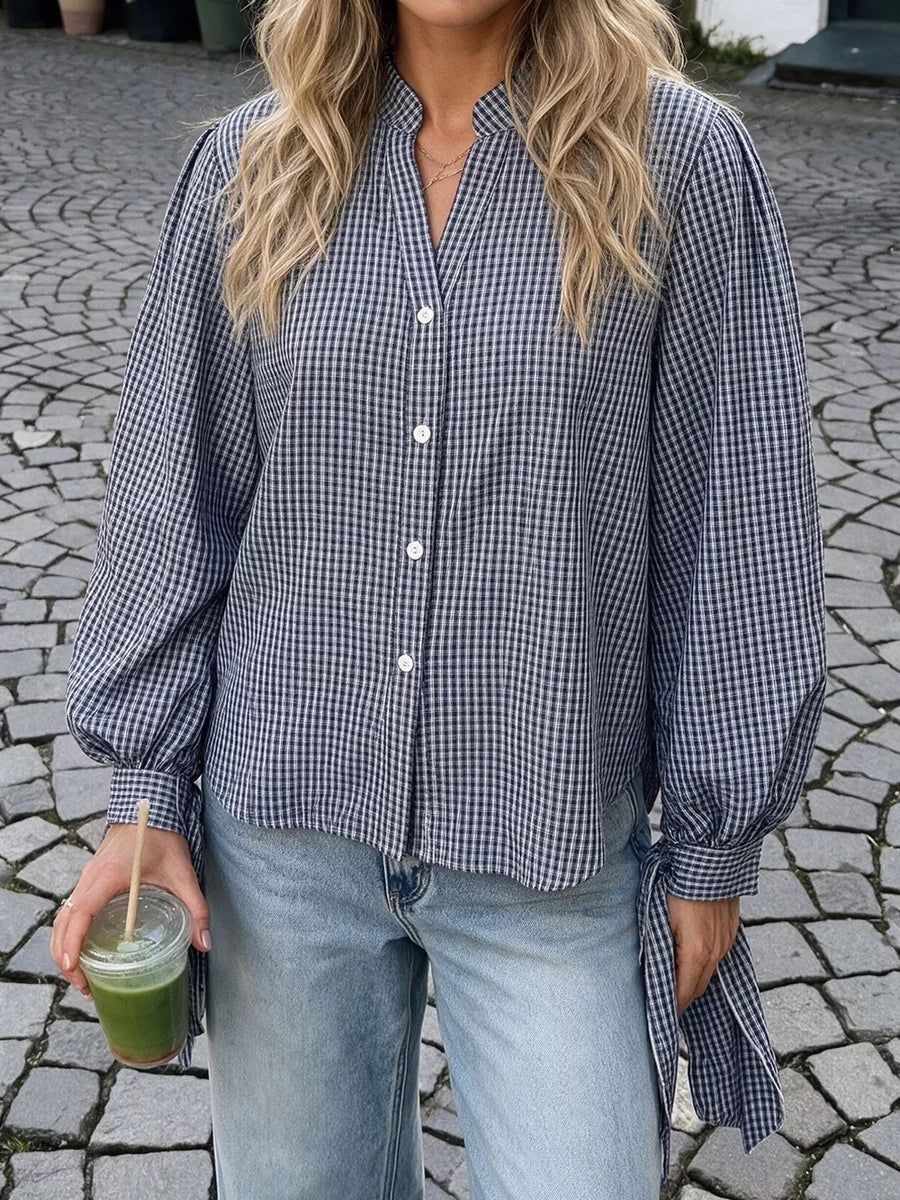 navy blue button-up shirt with hip-length and button-front