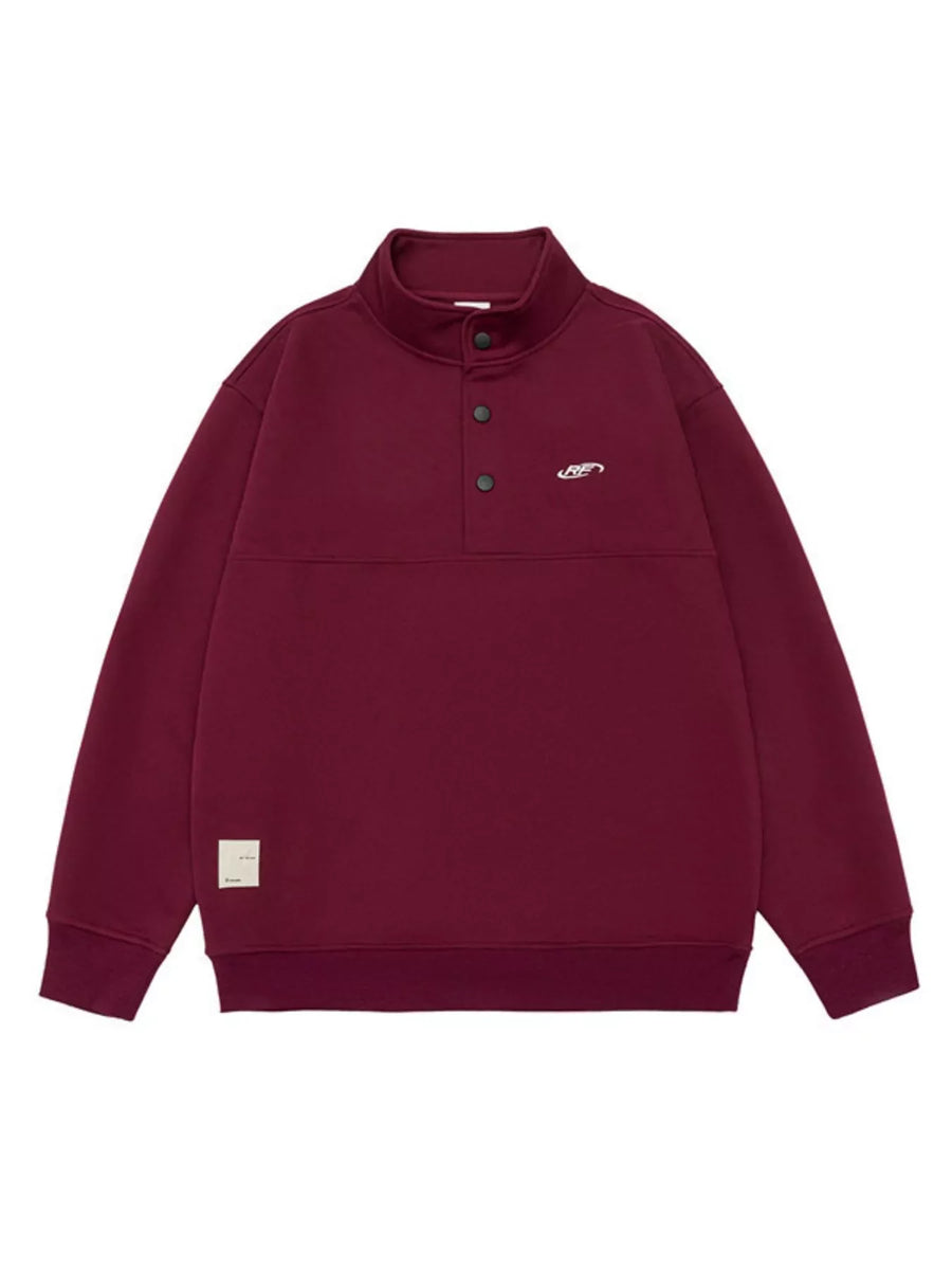 Maroon cotton blend sweatshirt with buttoned neckline and embroidered logo.
