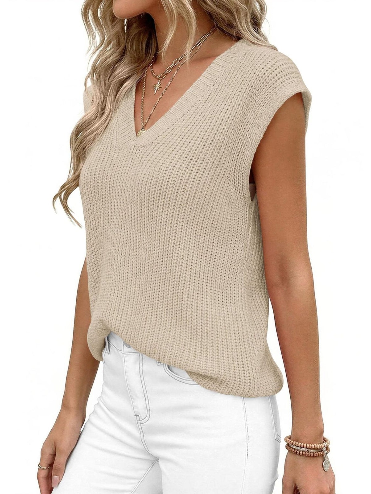 Textured apricot V-neck sweater vest with a ribbed knit and sleeveless design.