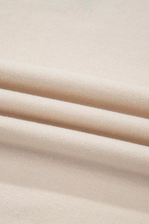 sweatshirt in tan with exposed seam and hip-length