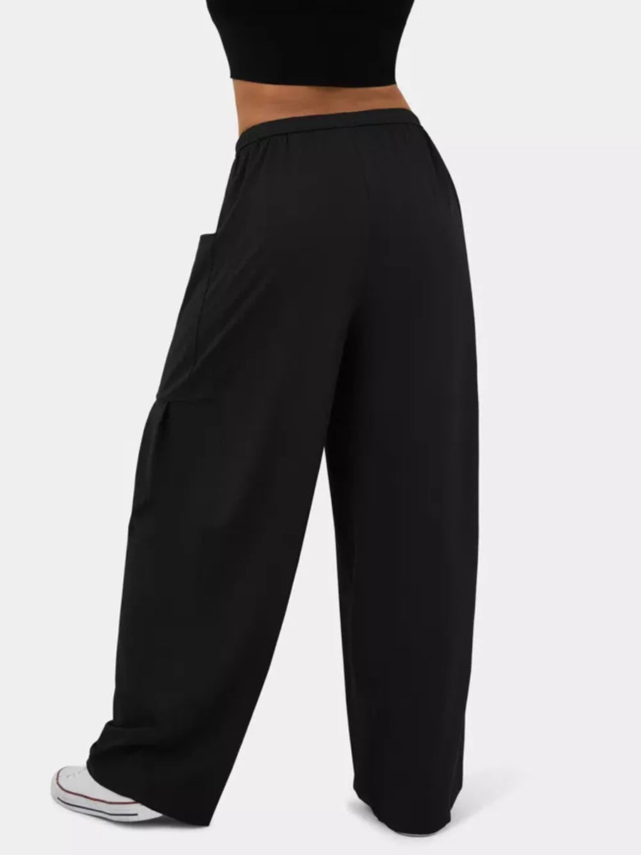 Black maternity wide-leg pants with cargo pockets and an adjustable waistband.
