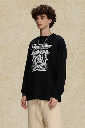 Black long sleeve graphic tee with bold white "Dreamers Paradise" print and abstract design