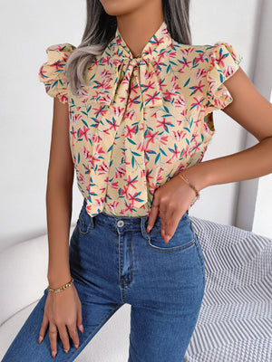 Apricot floral blouse with neck-tie and ruffle sleeves