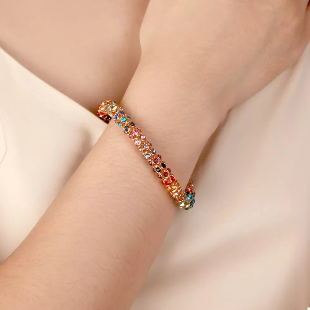 bracelet in gold featuring crystal embellishment and bracelet fit
