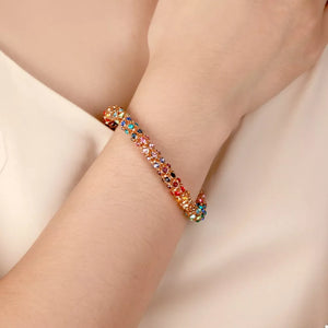 bracelet in gold featuring crystal embellishment and bracelet fit