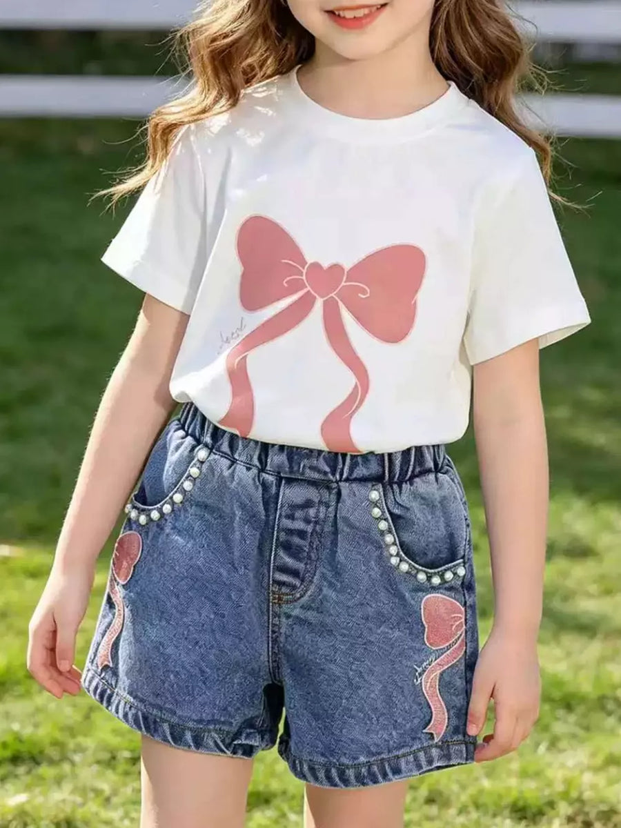 Charming bowknot tee and denim shorts set in Scarlet with bead embellishments.