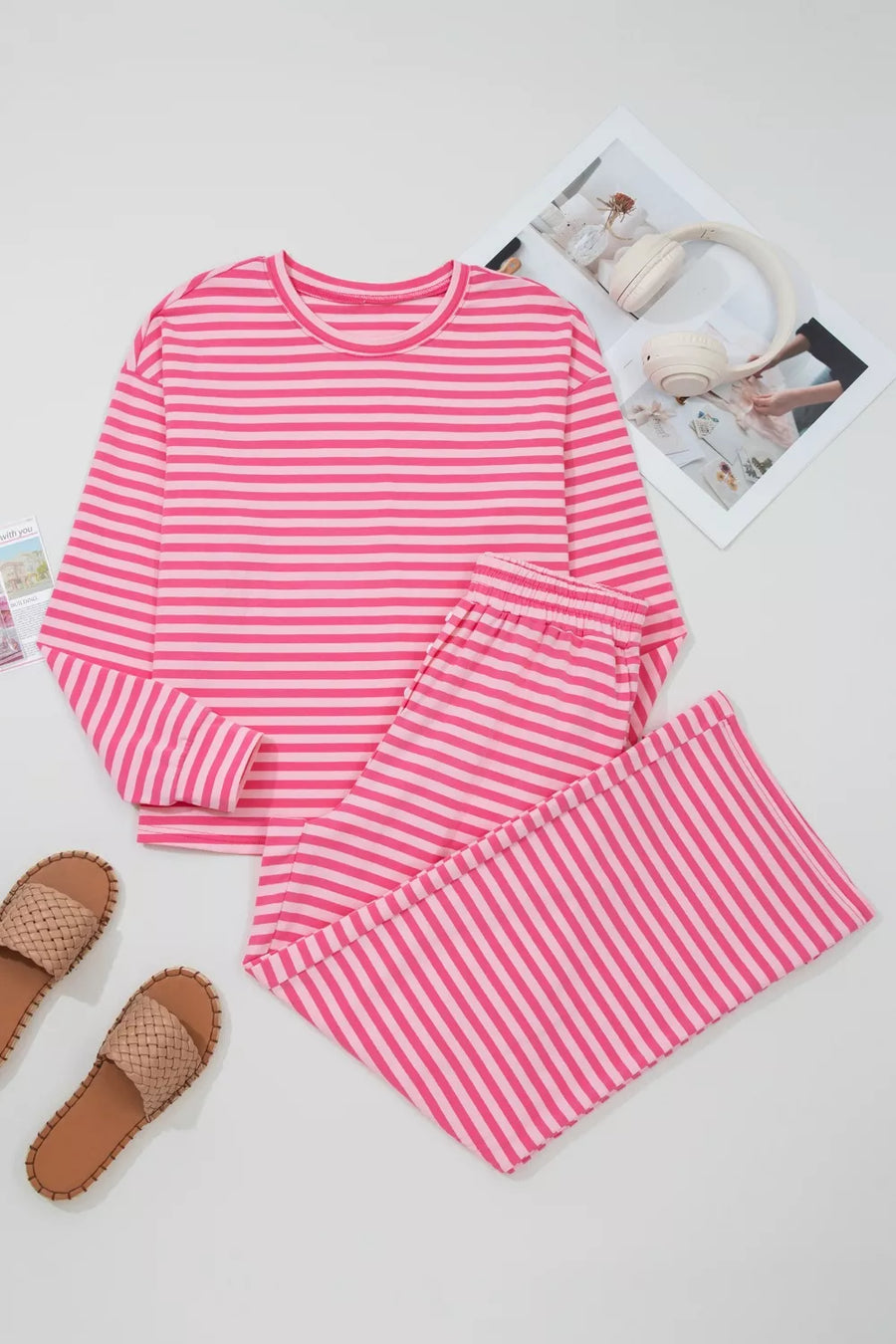 Chic pink striped cotton two-piece set with crew neck top and pants.