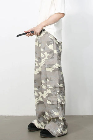 Urban Warrior cargo jeans in gray camouflage with multiple pockets and a relaxed fit.