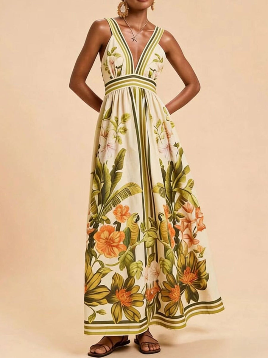 Maxi dress with tropical leaf and parrot print, V-neck, and striped trim.