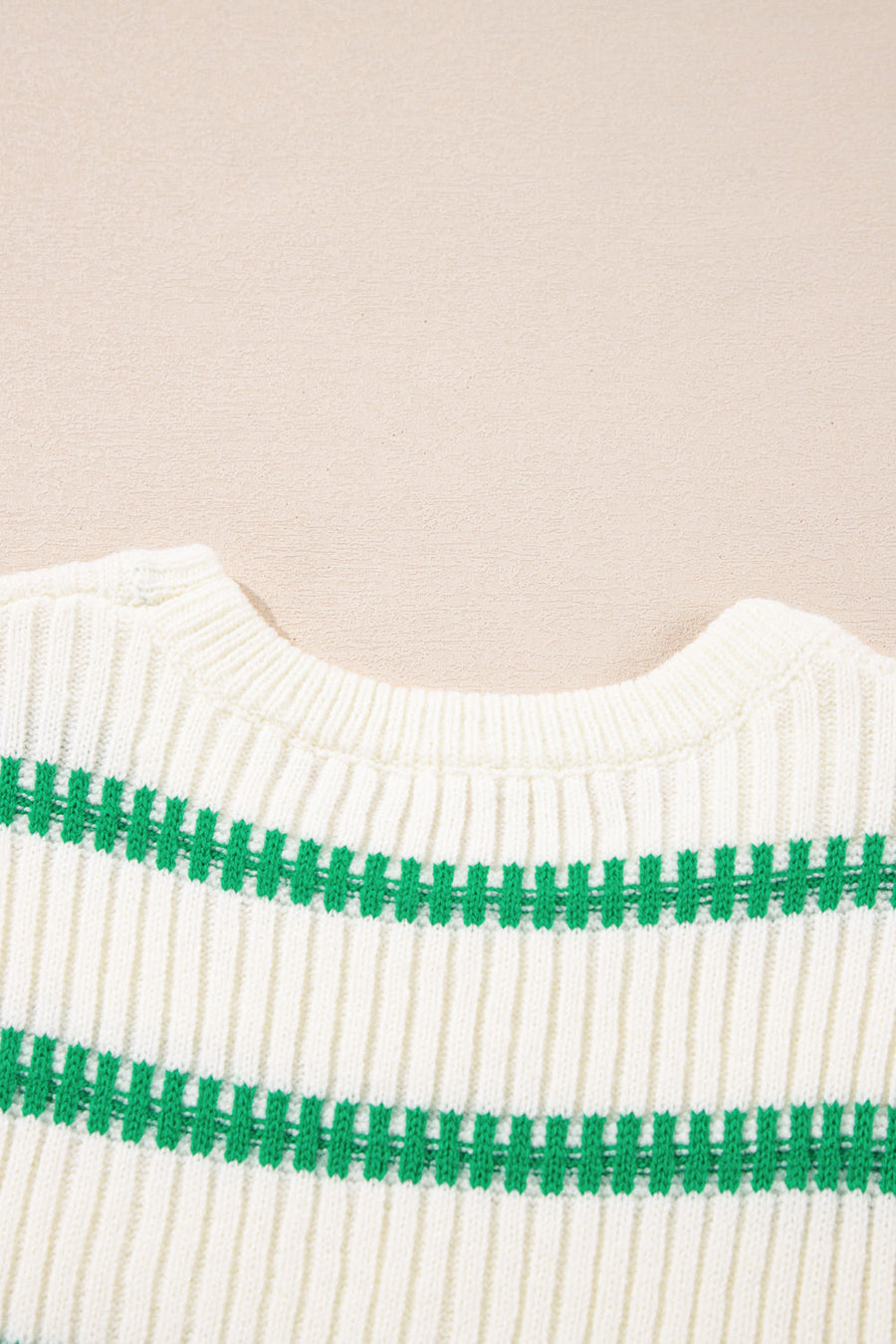 Ribbed knit vest in cream with green stitch stripes and a crew neck.
