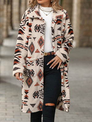 Longline teddy coat with Aztec print in cream, brown, and black, featuring pockets and a relaxed fit.