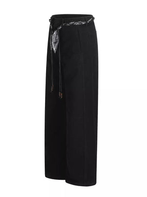 Black maternity pants with wide legs and a patterned belt with beaded ties.