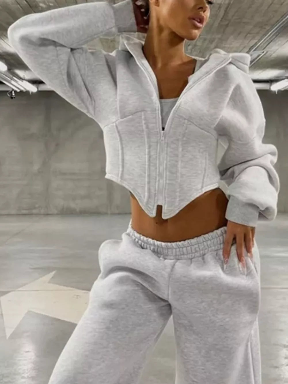zip hoodie in light gray featuring drawstring and fitted fit